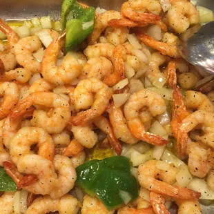 a bowl of shrimp and broccoli
