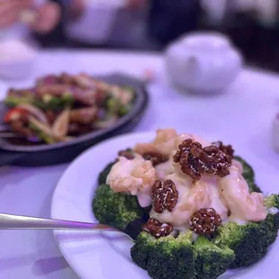 broccoli florets and raisins on a plate