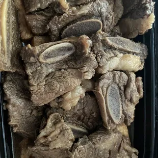 beef and mushrooms in a plastic container