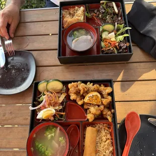 Bento box orange chicken and Mongolian beef came with soup a salad fried rice and an egg roll