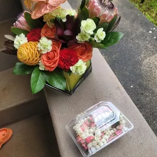Tropical bouquet and pikake lei