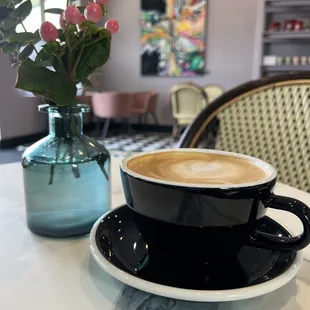 a cup of coffee on a table
