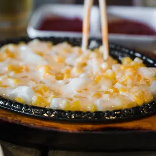 The onions in this corn cheese makes it