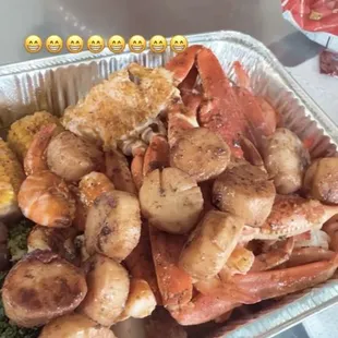 Broccoli Crab Legs Shrimp Corn And The scallops I made at home to add to my seafood platter