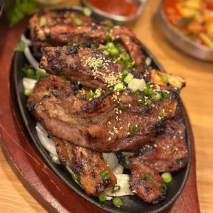 a plate of meat and vegetables