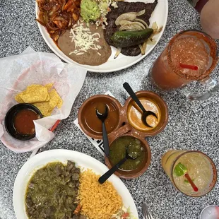 Lengua en Salsa Verde, Carne Asada con Camaron, spicy jalapeño Paloma, michelada