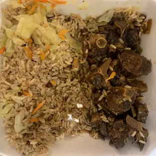 Oxtails, rice and peas and cabbage