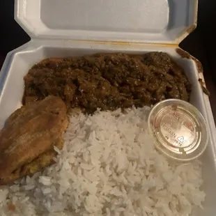 Legume, white rice, fried plantain, and pikliez. Forgot to photo black bean sauce.