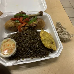 Haitian Fried Chicken, black rice, pikliz and plantains.  Everything was delicious.