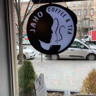 a sign for a coffee shop