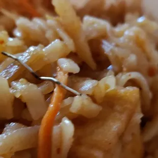 Pad Thai, closeup of metal staple