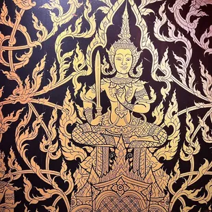 a painting of a seated buddha