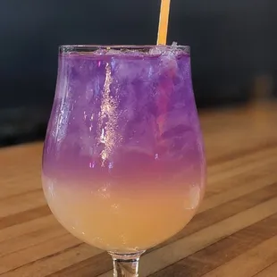 a purple and yellow drink