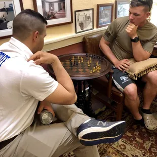 Cadets playing chess at the Inn