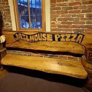 a wooden bench and barrel