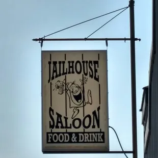 a sign for jailhouse saloon