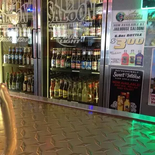 a glass of wine on the bar