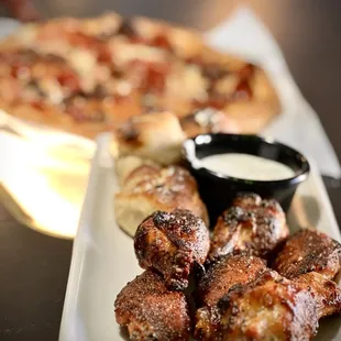 Wings, garlic knots, and pizza