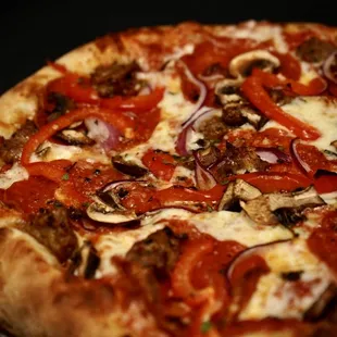 Jaime&apos;s Favorite - Pepperoni, House-made Sausage, Mushrooms, Red Onion, Grana and Fresh Herbs on our Classic Cheese