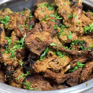 a bowl of cooked meat