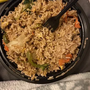 a bowl of rice and vegetables