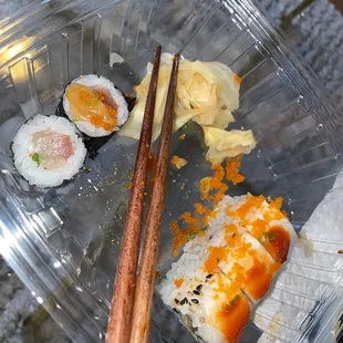 a sushi and chopsticks