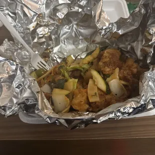 General Tso's Chicken, extra spicy, extra veggies.  Still coming out of the box, and I already ate some.