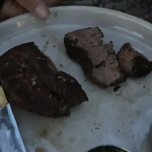 My friends steak she asked medium rare / but more rare