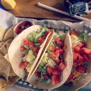 Fish Tacos - the fish &amp; batter were bland, &amp; the chips weren't salted, but thx for the plastic on the bottom of the tortilla. Nice save chef