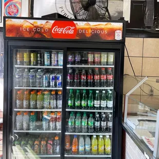 a refrigerated coca cola cooler
