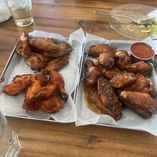 Dry rub, hot, and spicy garlic wings with dipping sauce