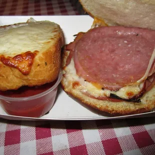 italian stacker  the inside view and garlic bread