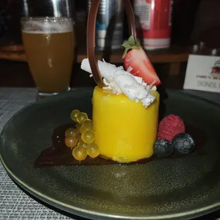 Pineapple &amp; Guava Soaked Pound Cake Tropical pineapple mousse, guava custard filling, soaked pound cake.
