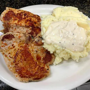 Pork chops with mash potatoes and gravy Forgot to post the house salad