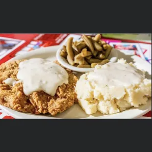 Chicken fried steak, dinner with toast and your choice of two sides