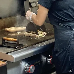 Cook making my sukiyaki sub.