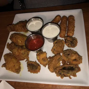 Sampler (wings, cheese sticks, and fried mushrooms.