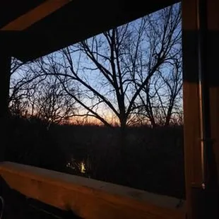 a view of the sunset from his deck