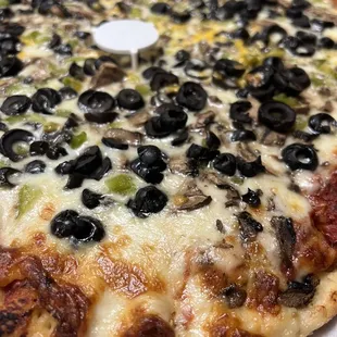 Custom large: black olives, green peppers, mushrooms