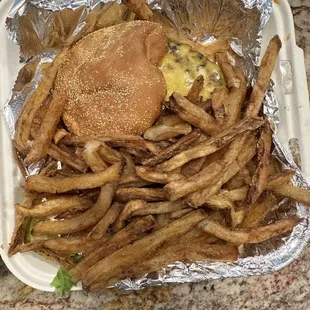 Cheeseburger paired with generous portion of fries!