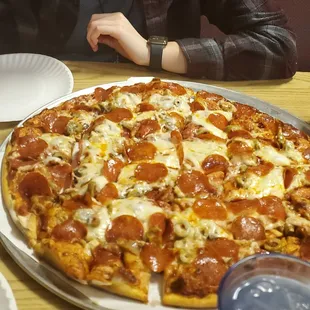 a pizza with pepperoni and cheese