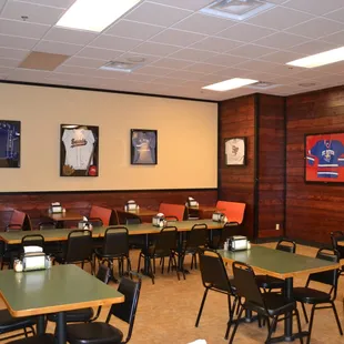 a dining room with tables and chairs