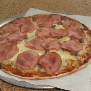 House Special- Our everything pizza with nine ingredients.