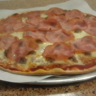 4 Meat- Italian Sausage, Canadian Bacon, Pepperoni and Ground  Beef.