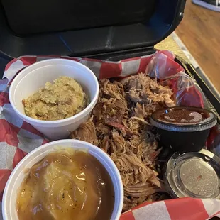 Pulled pork with two sides (mashed potatoes and cornbread stuffing)