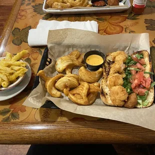 Shrimp Po' Boy with Beer Battered Fries and Mac N Cheese Southern Fried Catfish with Onion Rings and Beer Battered Fries
