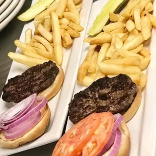 two burgers and fries