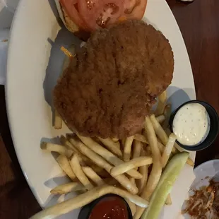 Spicy chicken sandwich and natural fries as a side