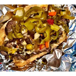 Italian Beef. Sweet / Hot peppers,mozzarella,dipped.  No Bad No The Bast ether . Was OK. Beef missing some Spicy Kick.