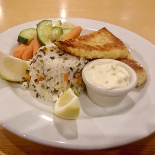 Walleye coated with Panko crumbs, rice pilaf, and mixed vegetables. Delicious!